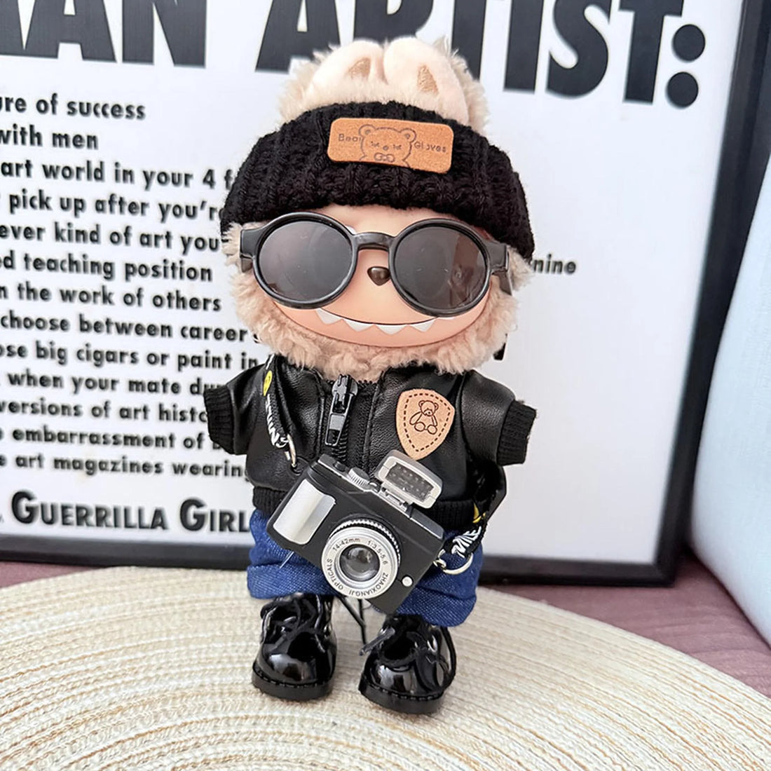 Labubu Clothes Labubu Bear Brand Black Leather Jacket + Deep-Cuffed Jeans + Black Flipped-Brim Hat + Lace-Up Black Dress Shoes + Black Camera + Black Sunglasses