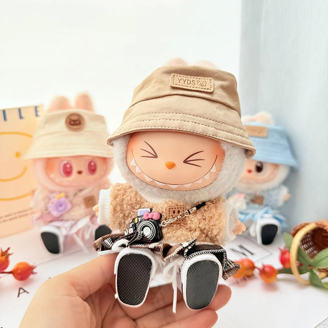 Labubu Clothes Labubu Kd Black Camera + Brown Yyds Cap + White Canvas Shoes + Brown Plaid Jk Skirt + Brown Smiley Sweater